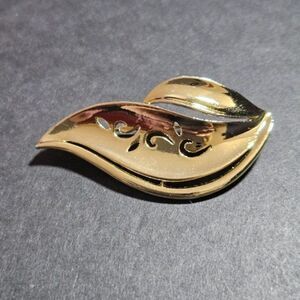 AJC vintage gold tone brooch